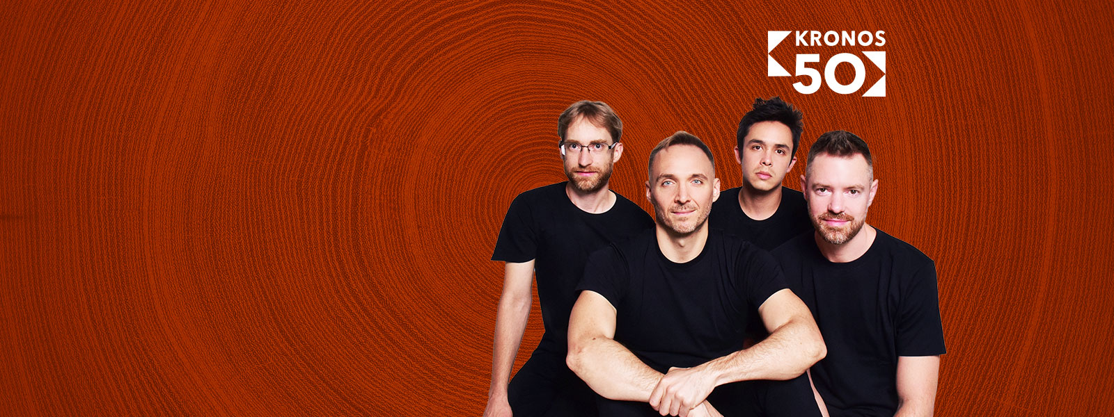 JACK Quartet smiling in a group