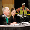 Adam Wesley/The Gazette A construction worker listens during a news conference announcing a collaboration on a new “Nutcracker” ballet at Hancher Auditorium in Iowa City on Tuesday, April 12, 2016.