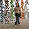 A sweet homecoming for artist alum who makes sculptures out of candy wrappers