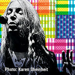 Patti Smith black and white photo cut out in front of a microphone against Hancher's Infinite Dream colored flag treatment