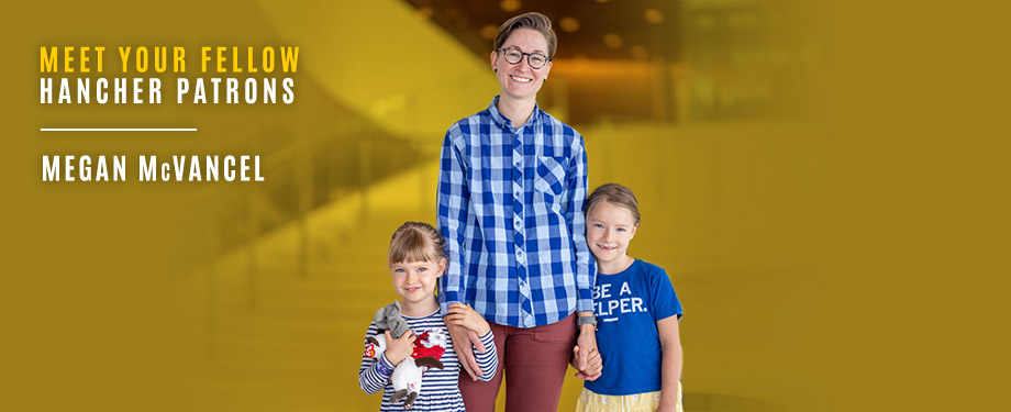 Megan McVancel stands in the Smith Lobby at Hancher Auditorium with her two children Megan McVancel stands in the Smith Lobby at Hancher Auditorium with her two children