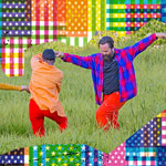 Meandering River Meandering River: Two dancers holding hands in movement in a grassy field