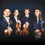 Four members of the Schumann Quartet against a black background