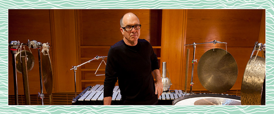 Steven Schick standing in front of percussion instruments