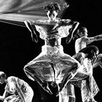 Trisha Brown Dance Company dancers in movement. Photo is in black and white